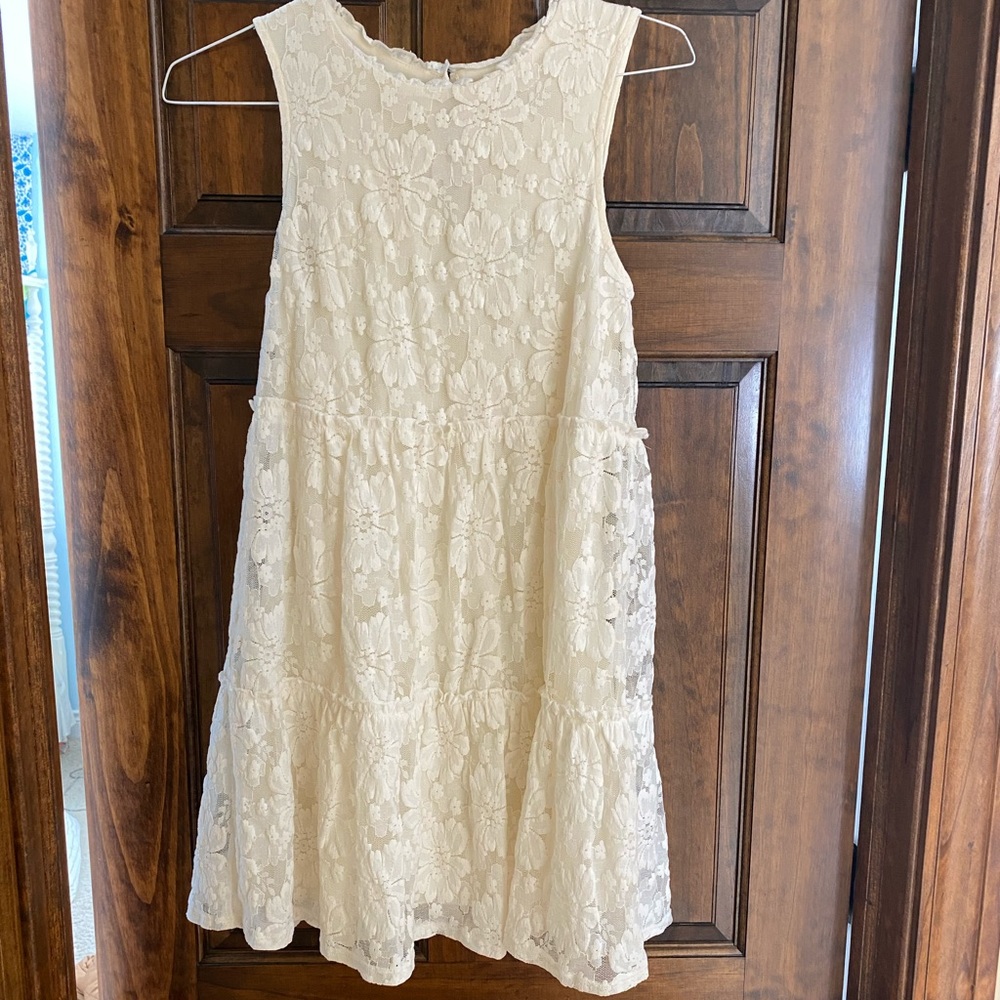 White and cream women’s dress